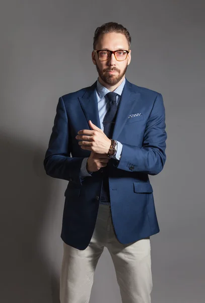 Fashionable handsome stylish bearded man with glasses — Stock Photo, Image