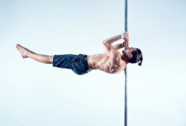 Pole dancing man — Stockfoto