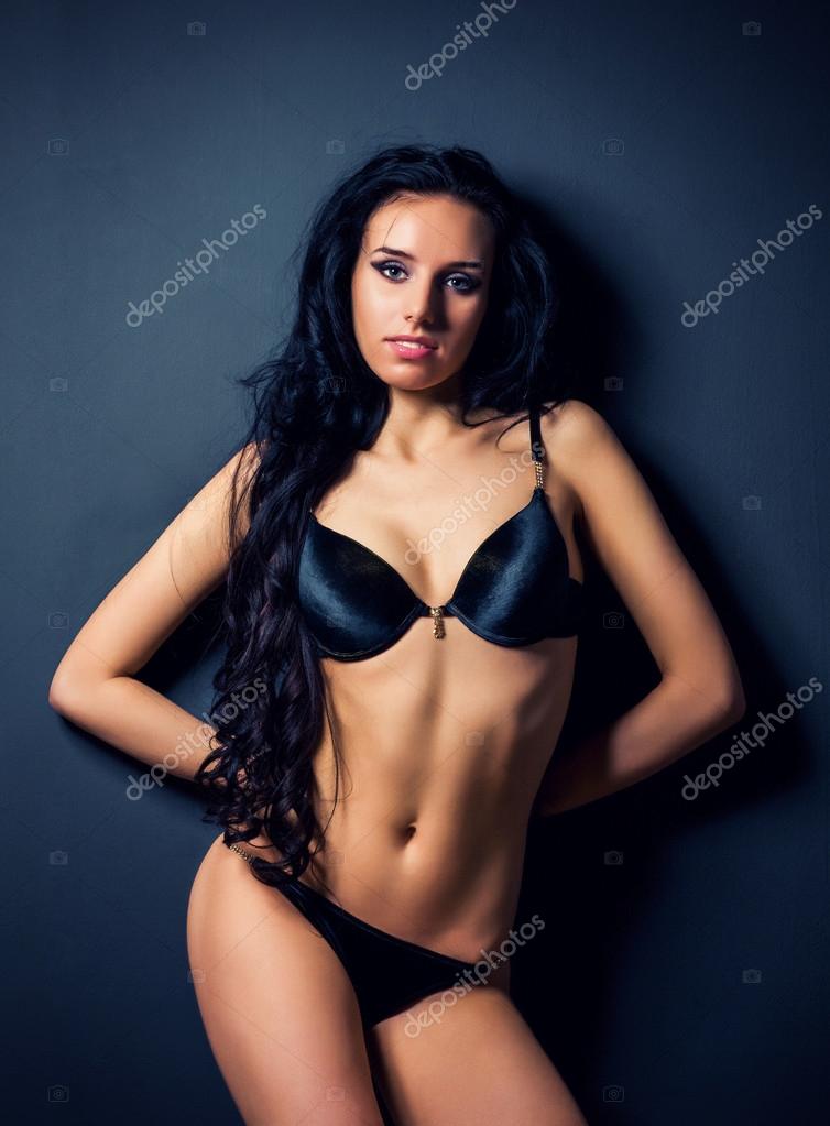 Young Woman In Black Lingerie Set Against The Old Walls Stock Photo,  Picture and Royalty Free Image. Image 20641939.