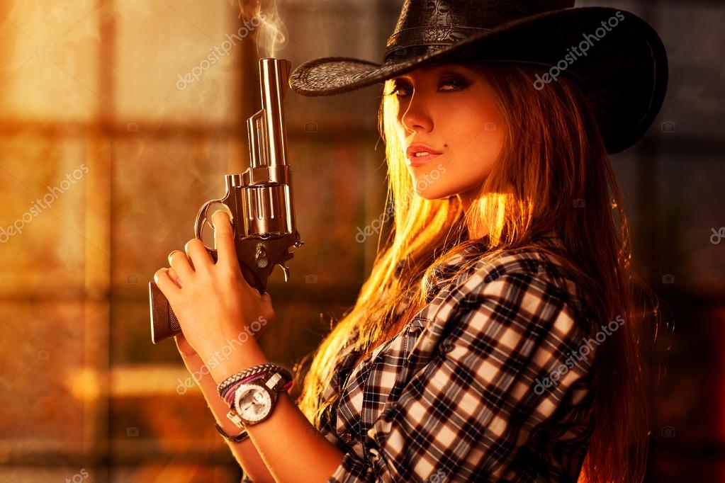 Young woman with gun Stock Photo by ©chaoss 54703699