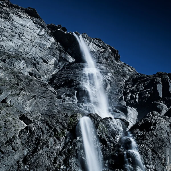 Waterfall in high mountains — Stock Photo, Image