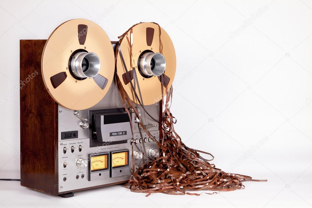 Open Reel Tape Deck Recorder Player with Messy Entangled Tape Stock Photo  by ©vittore 78273926