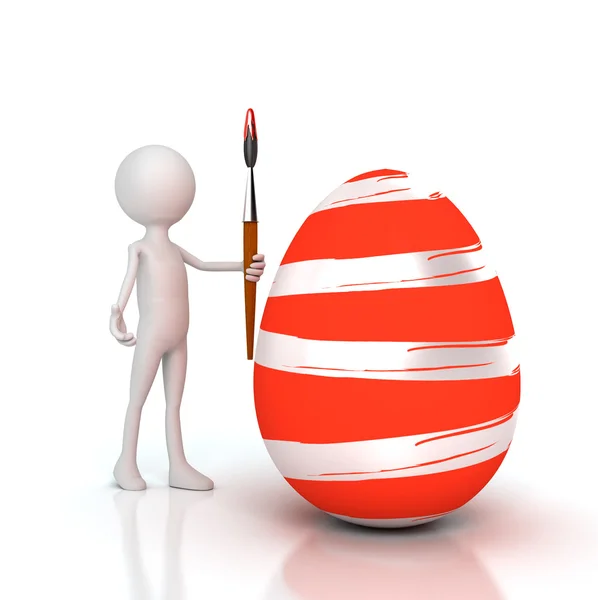 Persona pintando huevo de Pascua con pincel — Foto de Stock