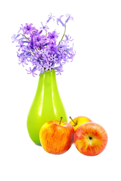 Isolated on white background bunch of flowers in a vase and appl — Stock Photo, Image