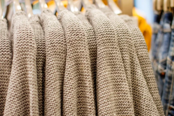 Wool sweater on a hanger in the store — Stock Photo, Image