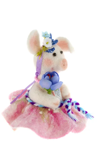 Porco de brinquedo branco em uma saia rosa — Fotografia de Stock