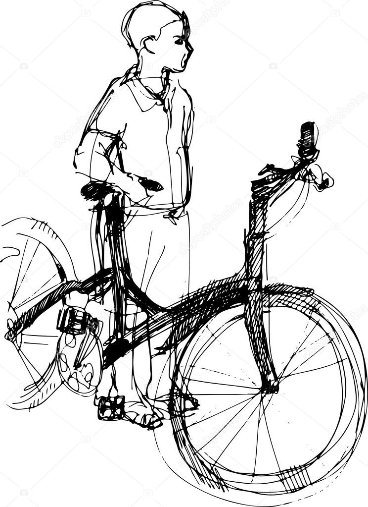 boy standing with bicycle 