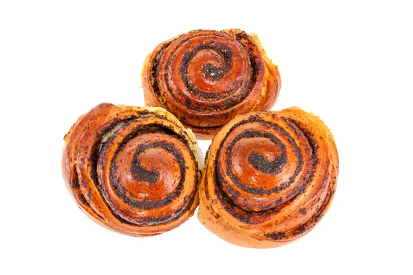 Drie heerlijke rolt broodjes met maanzaad op een witte achtergrond — Stockfoto