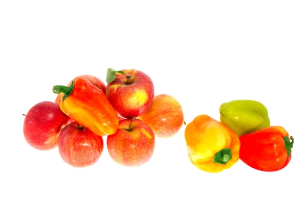 Red ripe apples and sweet pepper on a white background — Stock Photo, Image