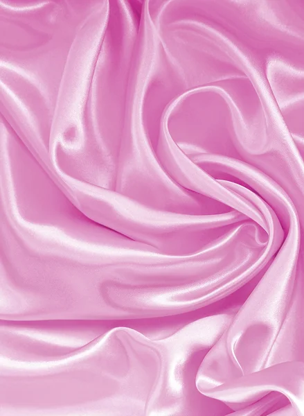 Texture lisse et élégante en soie rose ou satin comme fond — Photo