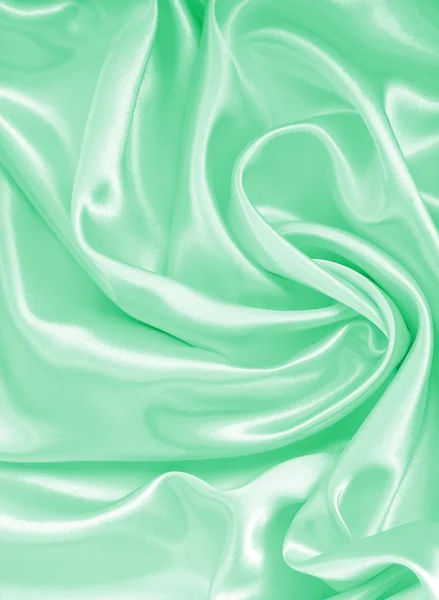 Smooth elegant green silk or satin texture as background — Stock Photo, Image