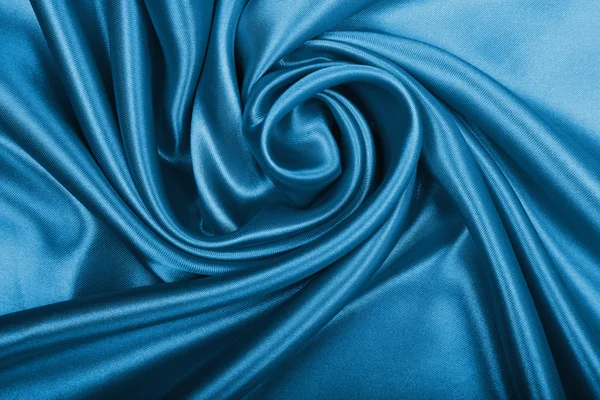 चिकनी सुंदर नीला रेशम पृष्ठभूमि के रूप में उपयोग कर सकता है — स्टॉक फ़ोटो, इमेज