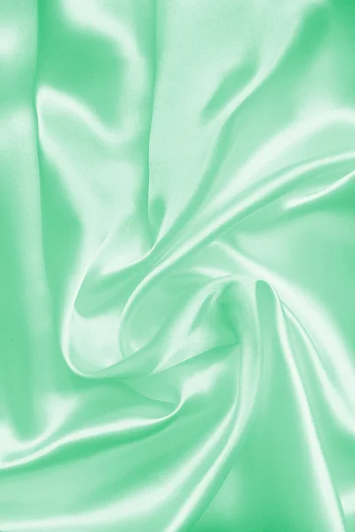 Smooth elegant green silk or satin texture as background — Stock Photo, Image