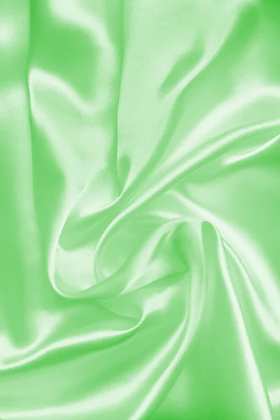 Texture lisse et élégante de soie verte ou de satin comme fond — Photo