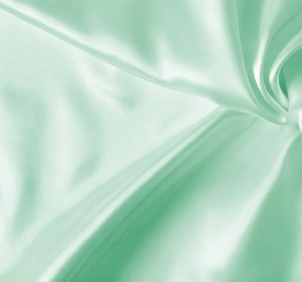 Smooth elegant green silk or satin texture as background — Stock Photo, Image