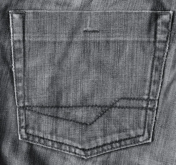 Zwarte jeans stof met zak als achtergrond — Stockfoto