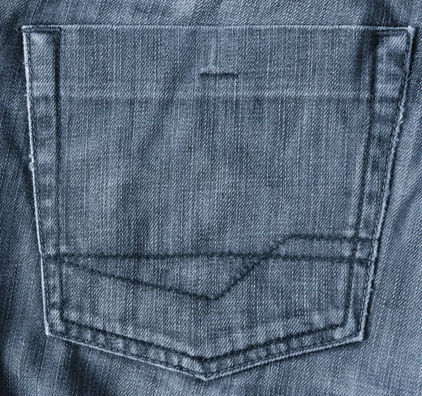 Tecido de jeans azul com bolso como fundo — Fotografia de Stock