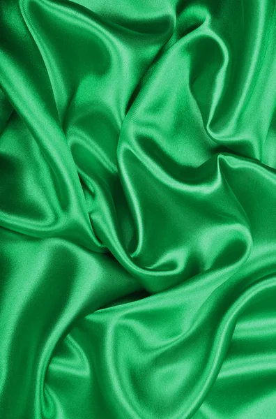 光滑的优雅绿色丝绸或缎子为背景 — 图库照片