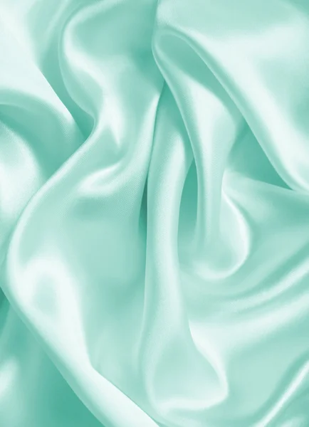 Sima, elegáns kék selyem, vagy szatén a textúra a háttér — Stock Fotó