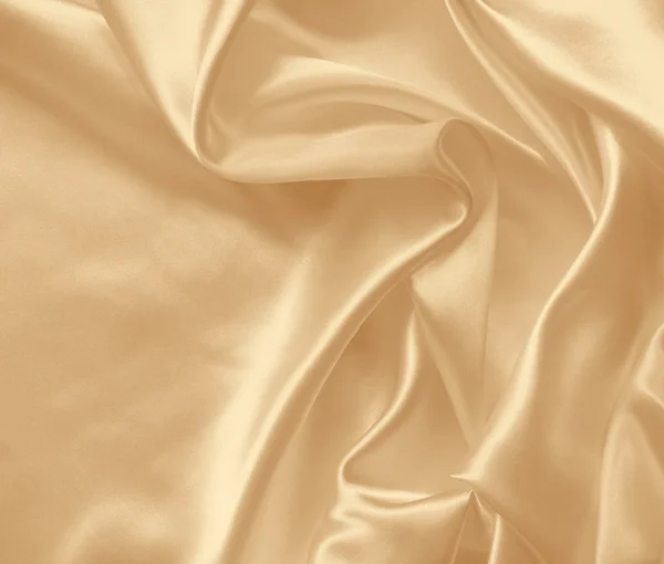 Smooth elegant golden silk or satin as wedding background. In Se — Stock Photo, Image