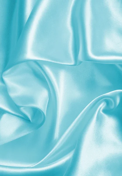 Glatt, elegant blå silke eller sateng som bakgrunn – stockfoto