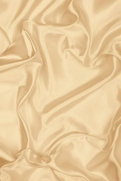 Hladké elegantní zlaté hedvábí jako svatební pozadí. V sépie tónovaný — Stock fotografie