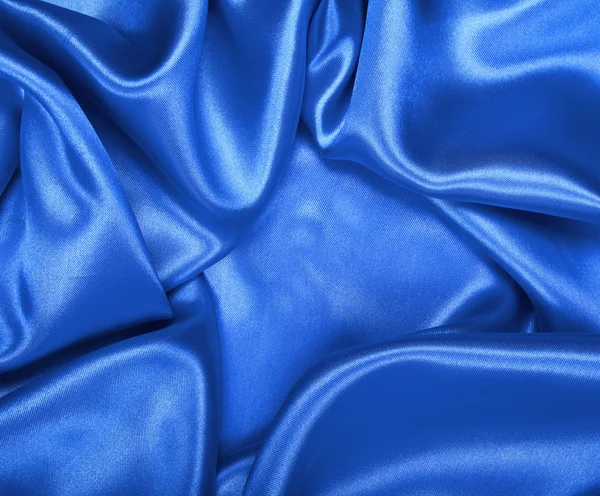 Slät elegant blå siden eller satin som bakgrund — Stockfoto