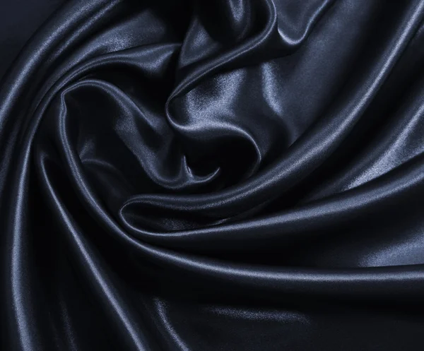 Ομαλή κομψό σκούρο γκρι μετάξι ή σατέν ως φόντο — Φωτογραφία Αρχείου