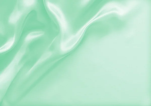 Glatte, elegante grüne Seiden- oder Satin-Textur als Hintergrund — Stockfoto