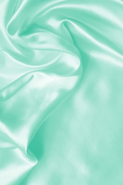 Smooth elegant green silk or satin texture as background — Stock Photo, Image