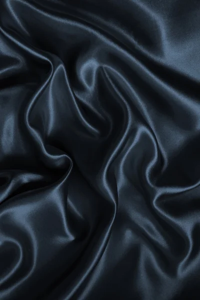 Ομαλή κομψό σκούρο γκρι μετάξι ή σατέν ως φόντο — Φωτογραφία Αρχείου