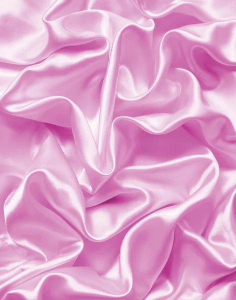 Hladké elegantní růžové hedvábí nebo satén textury pozadí — Stock fotografie