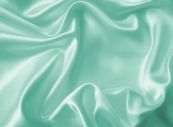 Smooth elegant green silk or satin texture as background — Stock Photo, Image