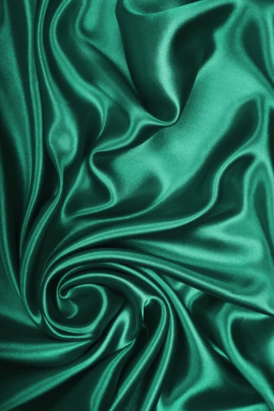 Glatte, elegante grüne Seide oder Satin als Hintergrund — Stockfoto