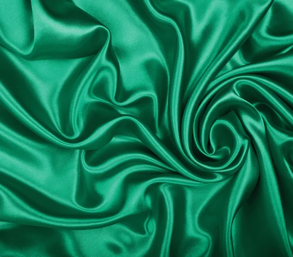 Glat elegant grøn silke eller satin tekstur som baggrund - Stock-foto