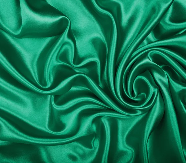 Texture lisse et élégante de soie verte ou de satin comme fond — Photo