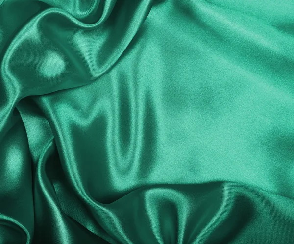 Sima, elegáns zöld selyem, vagy szatén, mint háttér — Stock Fotó