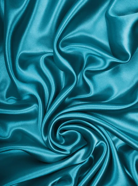 Glatte, elegante blaue Seide oder Satin als Hintergrund — Stockfoto