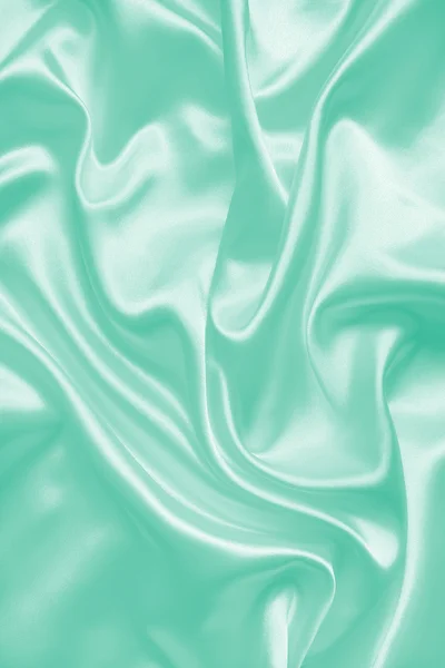 Glatte, elegante grüne Seiden- oder Satin-Textur als Hintergrund — Stockfoto