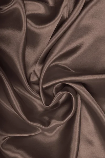 Slät elegant brun siden eller satin som bakgrund. I Sepia tonad — Stockfoto