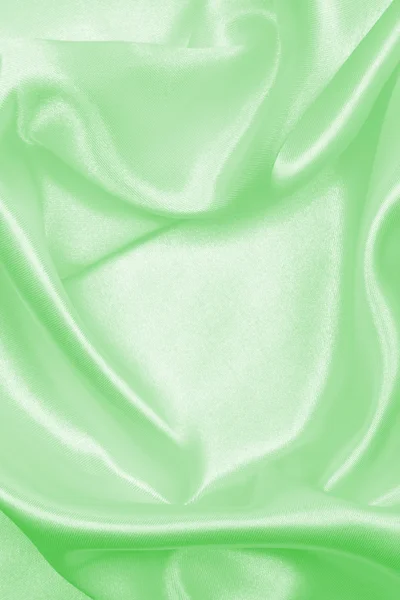 Smooth elegant green silk or satin texture as background — Stock Photo, Image