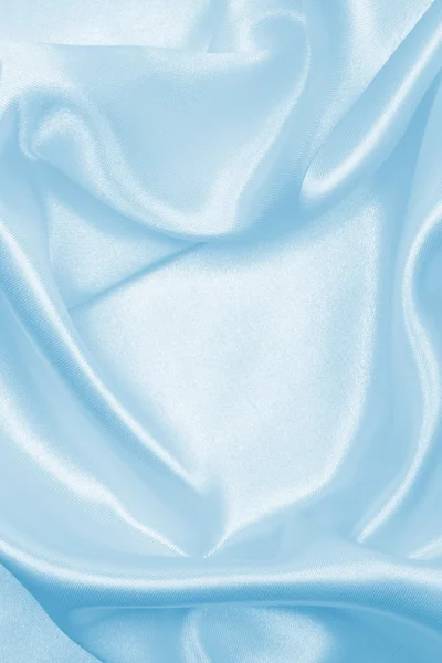 Гладкий элегантный синий шелк или атласная текстура в качестве фона — стоковое фото