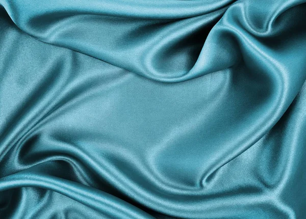 滑らかなエレガントな青シルクやサテン高級布テクスチャは抽象的な背景として使用することができます 豪華な背景デザイン — ストック写真