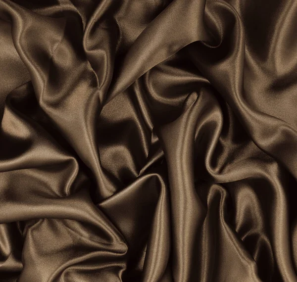 光滑雅致的褐色丝绸或缎子质感可以用作抽象的背景 豪华的背景设计 塞皮亚说话了 复古风格 — 图库照片