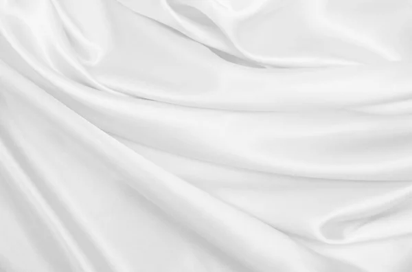 滑らかなエレガントな白いシルクやサテン高級布テクスチャは結婚式の背景として使用することができます 豪華な背景デザイン — ストック写真