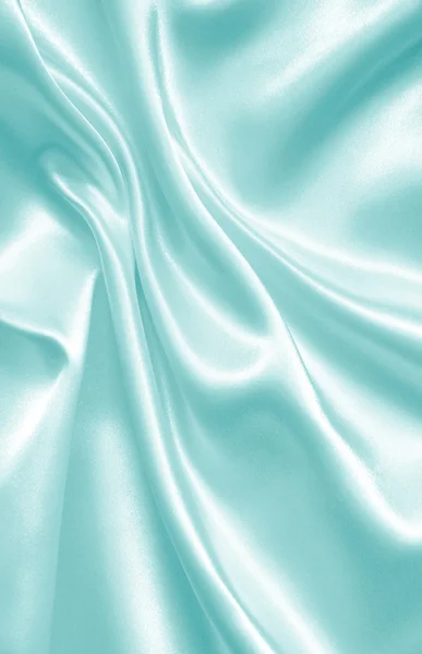 Gladde elegante blauwe zijde textuur — Stockfoto