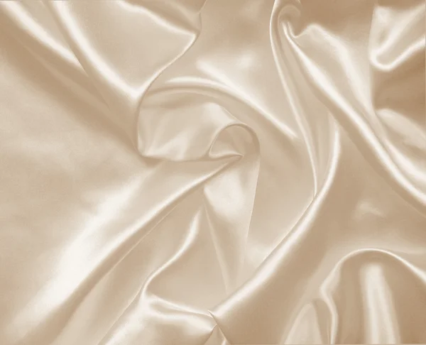 Textura suave y elegante seda dorada — Foto de Stock