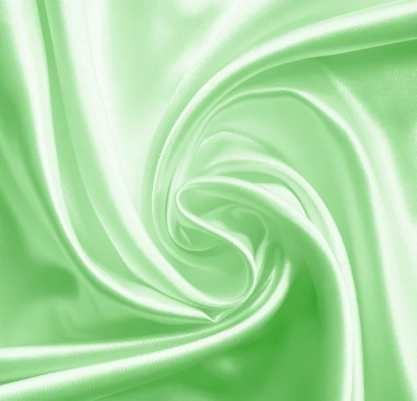 Green silk or satin as background — Stock Photo, Image