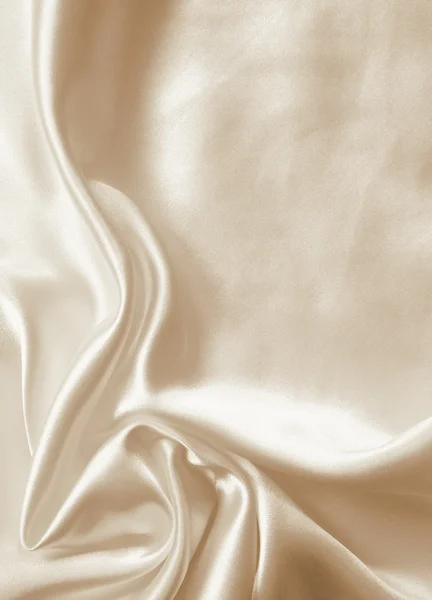 Golden silk cloth with folds — Stock Photo, Image