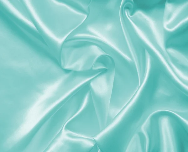 Glatt, elegant blå silke eller sateng som bakgrunn – stockfoto